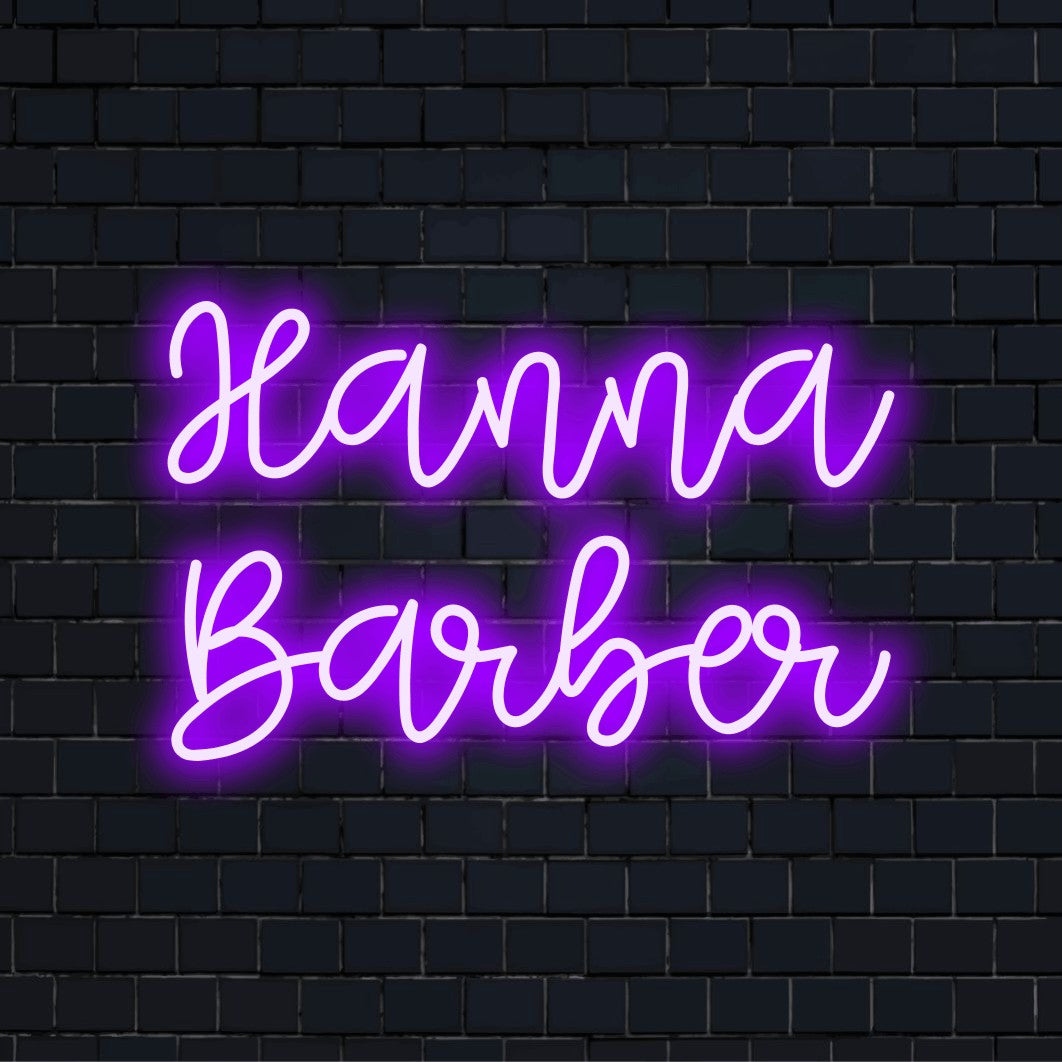 Hanna Barber Custom Name Neon Sign, bright neon lettering on dark brick wall