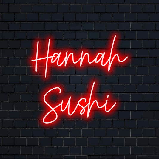 Hannah Sushi Custom Name Neon Sign, bright neon glow against black brick wall