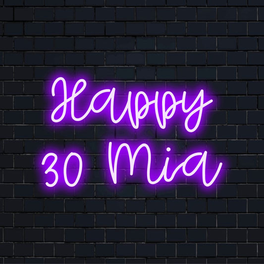 Happy 30 Mia Personalized Neon Light with soft neon glow against black brick wall