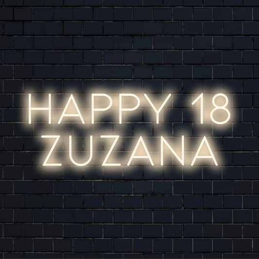 Happy 18 Zuzana Custom Name Neon Sign, glowing neon text against black brick wall