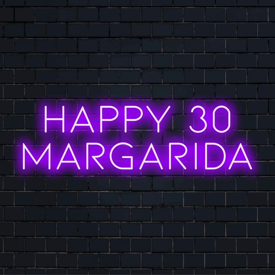 Happy 30 Margarida Personalized LED Neon Sign, bright LED glow on black brick background