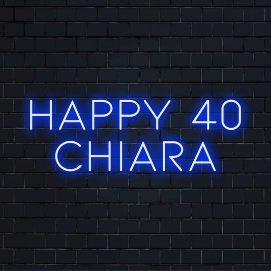 Happy 40 Chiara Personalized LED Neon Sign, glowing lettering against black brick wall