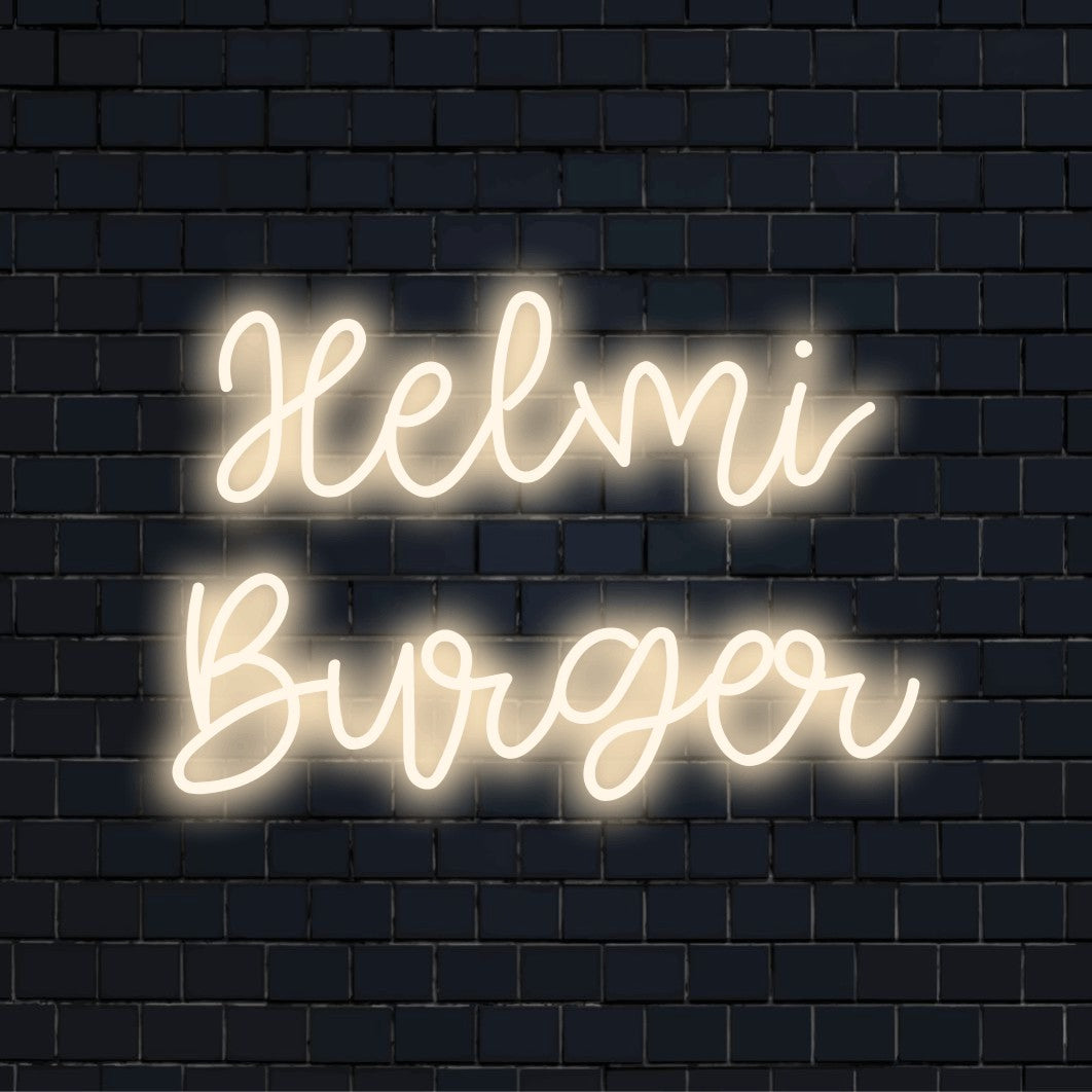 Helmi Burger Personalized Neon Light with glowing lettering against brick backdrop