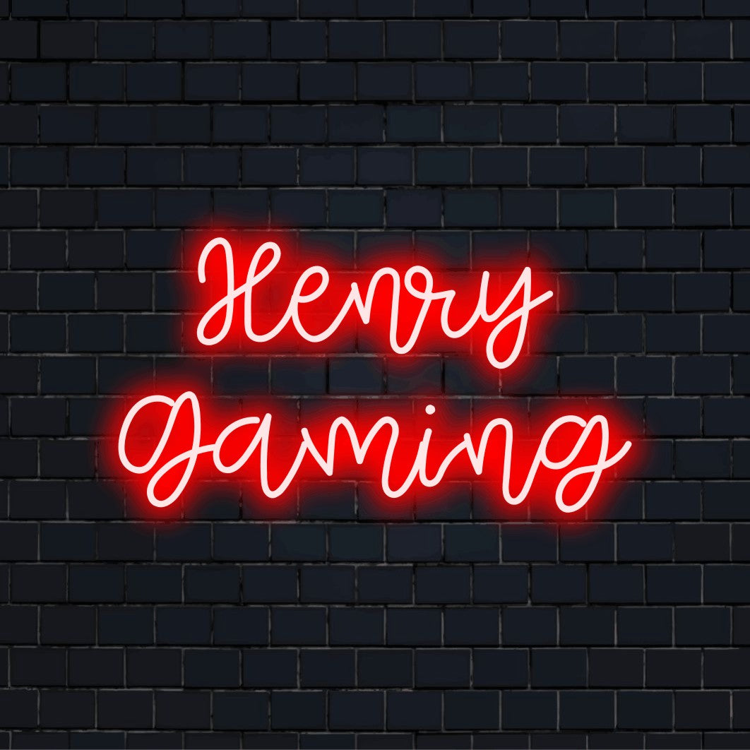 Henry Gaming Personalized Neon Light with glowing lettering against brick backdrop