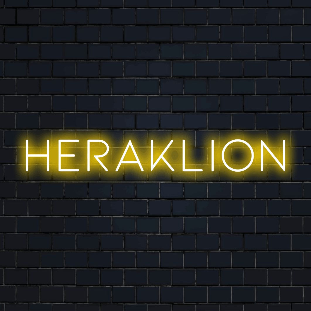 Heraklion Neon Light with glowing lettering on dark brick background