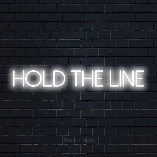 "Hold The Line" text design with neon effect on a black brick wall
