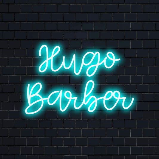 Hugo Barber Personalized Neon Light with bright LED glow on dark brick background