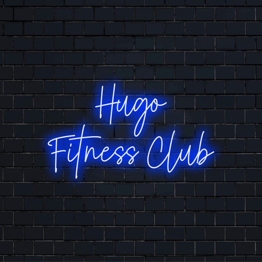 Hugo Fitness Club Personalized Neon Light with neon text light against brick backdrop