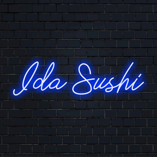 Ida Sushi Personalized LED Neon Sign, bright neon glow on dark brick wall