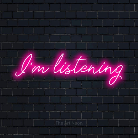 "I’m Listening" glowing LED neon sign on a black brick wall