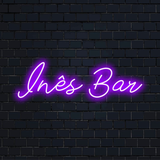 Ines Bar Custom Name Neon Sign, bright LED glow against black brick wall