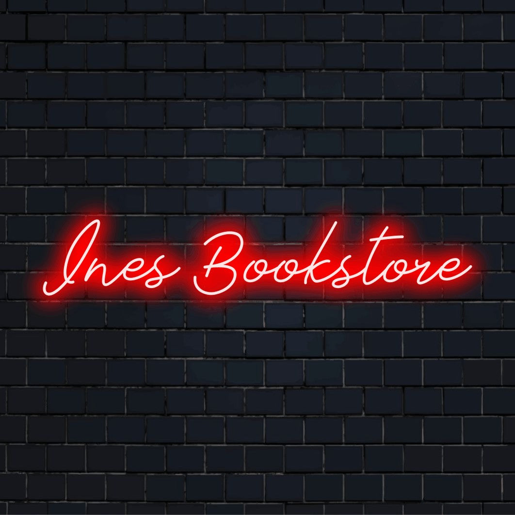 Ines Bookstore Custom Name Neon Sign, glowing neon text on dark brick background