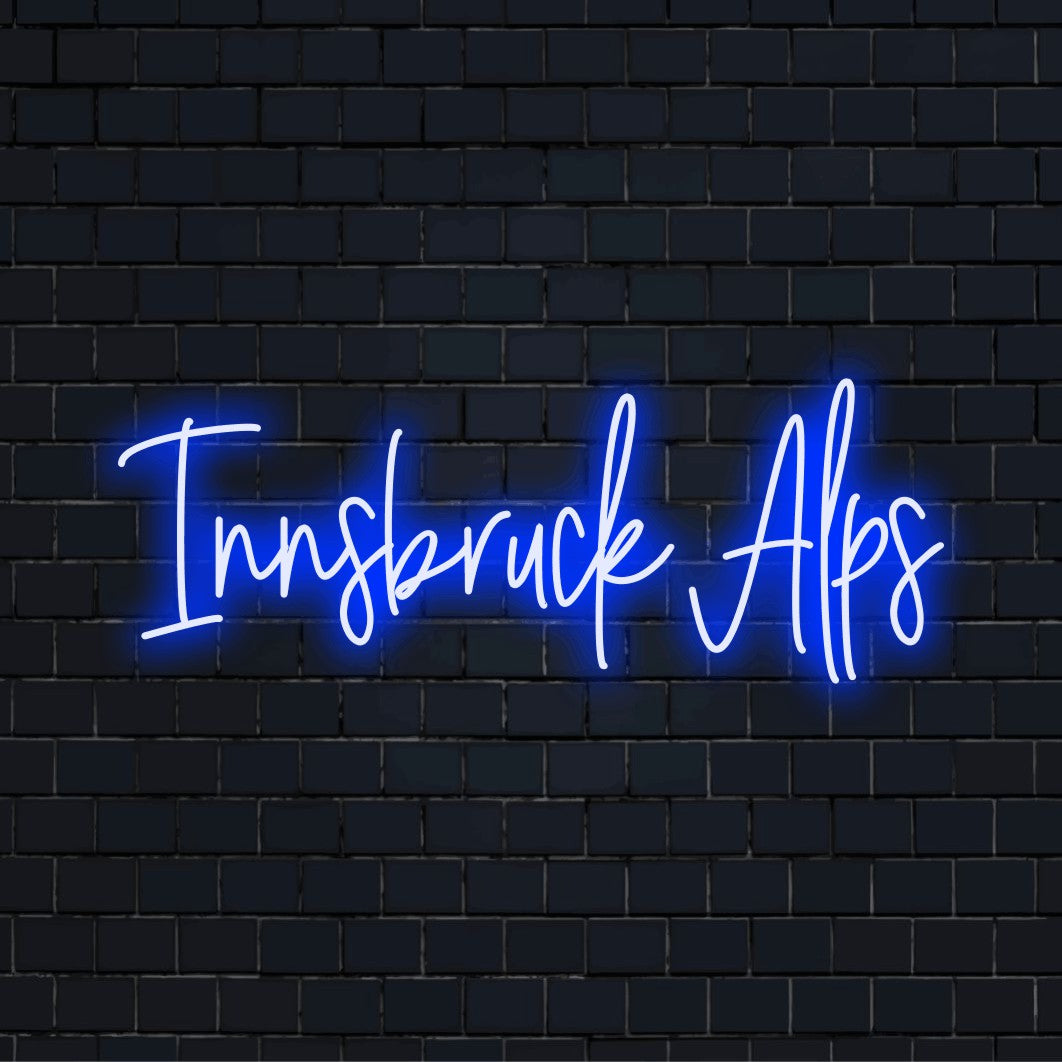Innsbruck Alps Neon Sign, glowing wall decor on dark brick background
