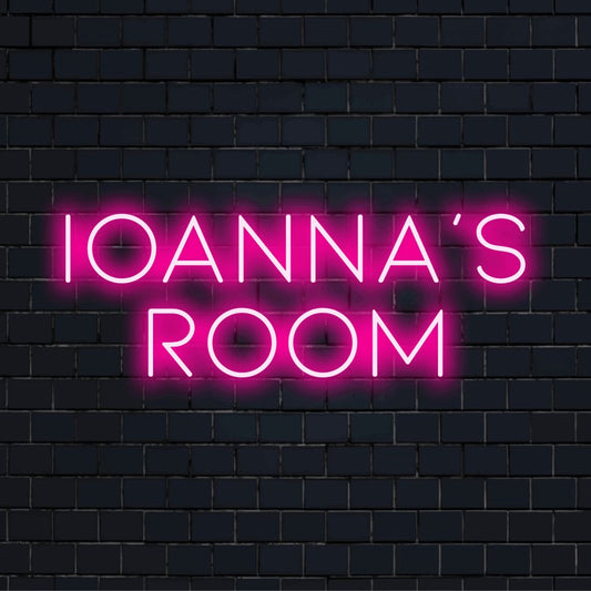Ioanna_s Room Custom Name Neon Sign, glowing neon text against black brick wall