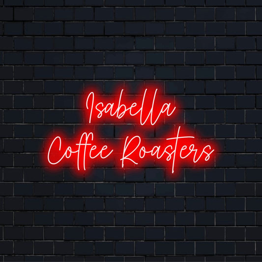Isabella Coffee Roasters Custom Name Neon Sign, glowing wall decor against brick backdrop