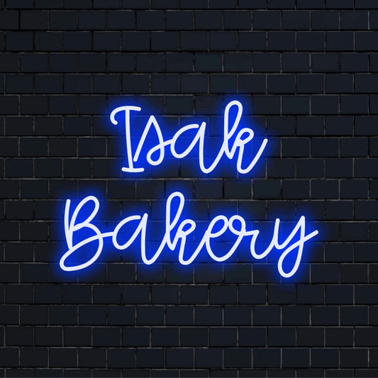 Isak Bakery Personalized LED Neon Sign, bright LED glow against black brick wall