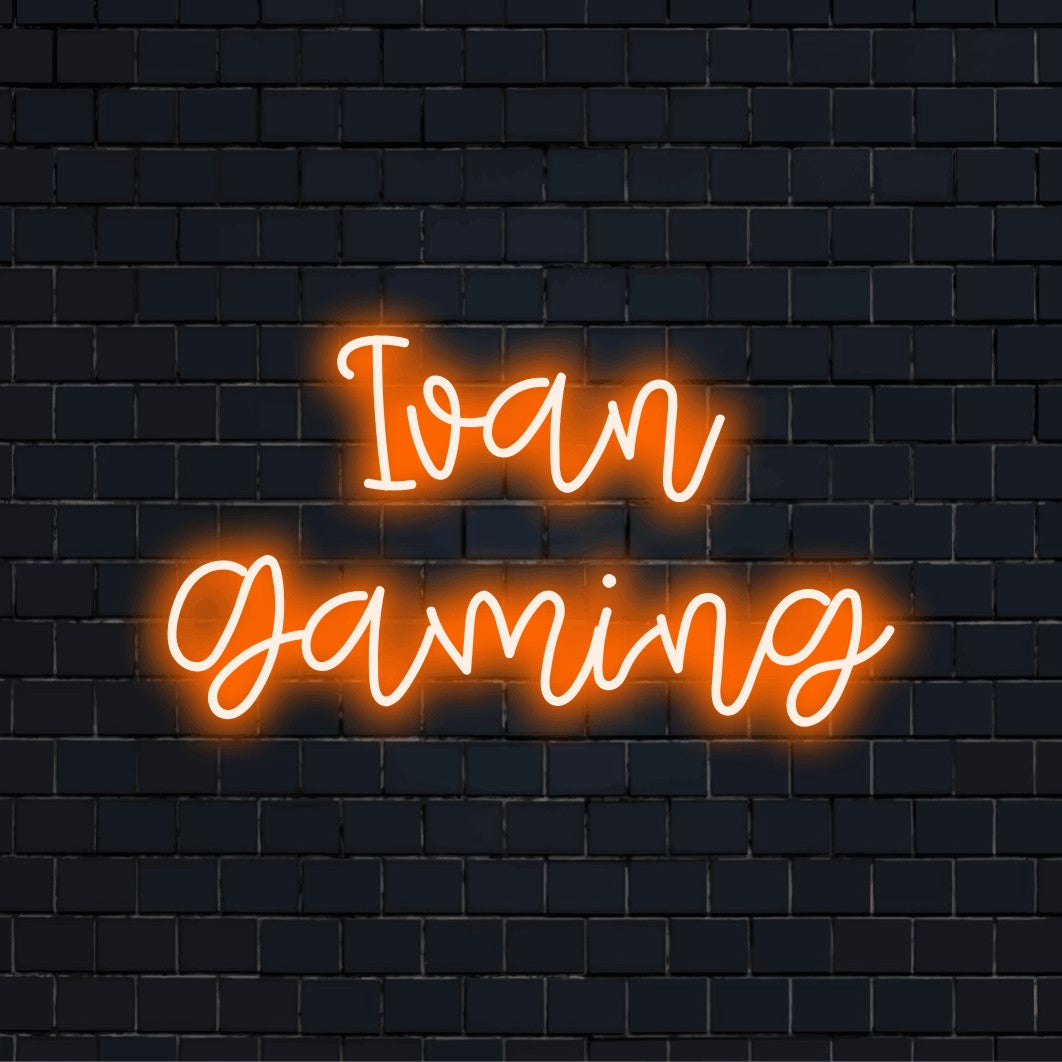 Ivan Gaming Personalized LED Neon Sign, glowing lettering against black brick wall