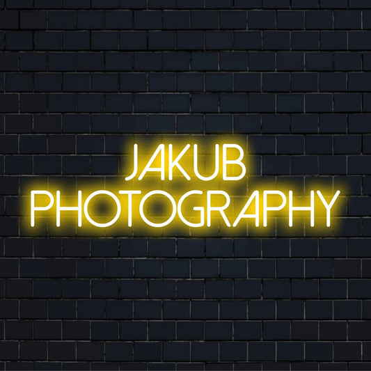 Jakub Photography Personalized LED Neon Sign, bright neon lettering on dark brick background