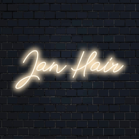 Jan Hair Custom Name Neon Sign, glowing wall decor against black brick wall