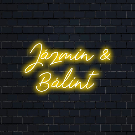 Jazmin _ Balint Custom Name Neon Sign, glowing neon text against brick backdrop