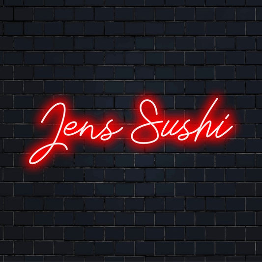 Jens Sushi Personalized Neon Light with neon text light on black brick background
