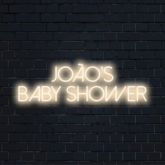 Joao_s Baby Shower Personalized LED Neon Sign, bright LED glow on dark brick wall
