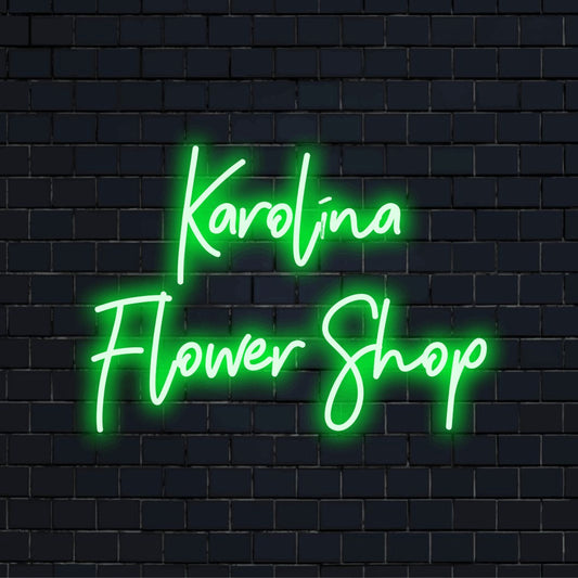 Karolina Flower Shop Personalized Neon Light with glowing wall decor against brick backdrop
