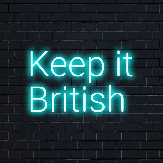 Keep It British Neon Sign, bright neon glow against black brick wall