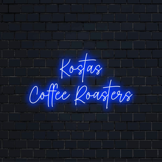 Kostas Coffee Roasters Custom Name Neon Sign, bright neon lettering against brick backdrop