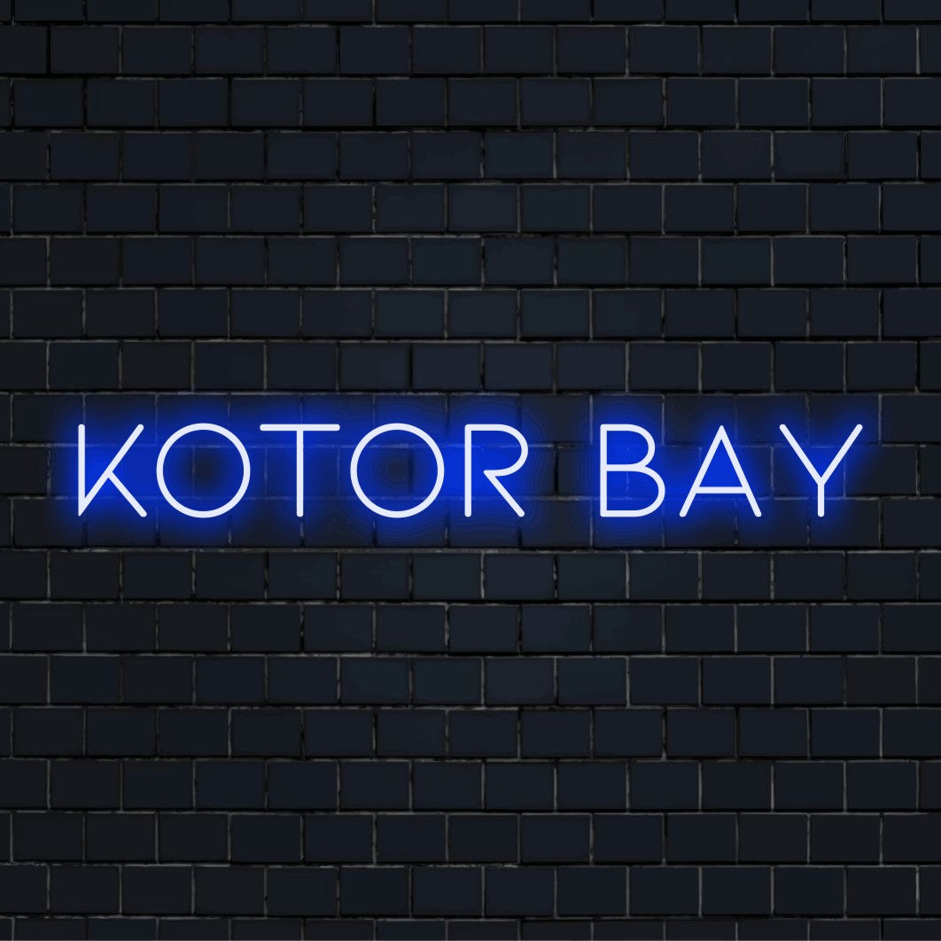 Kotor Bay LED Neon Sign, glowing wall decor against brick backdrop