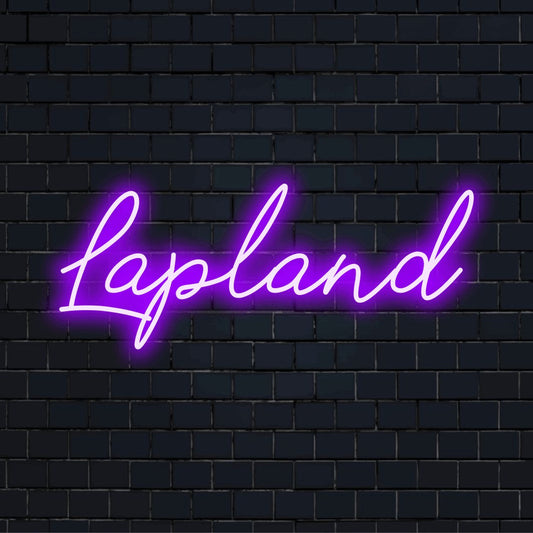 Lapland Neon Light with bright neon glow against brick backdrop