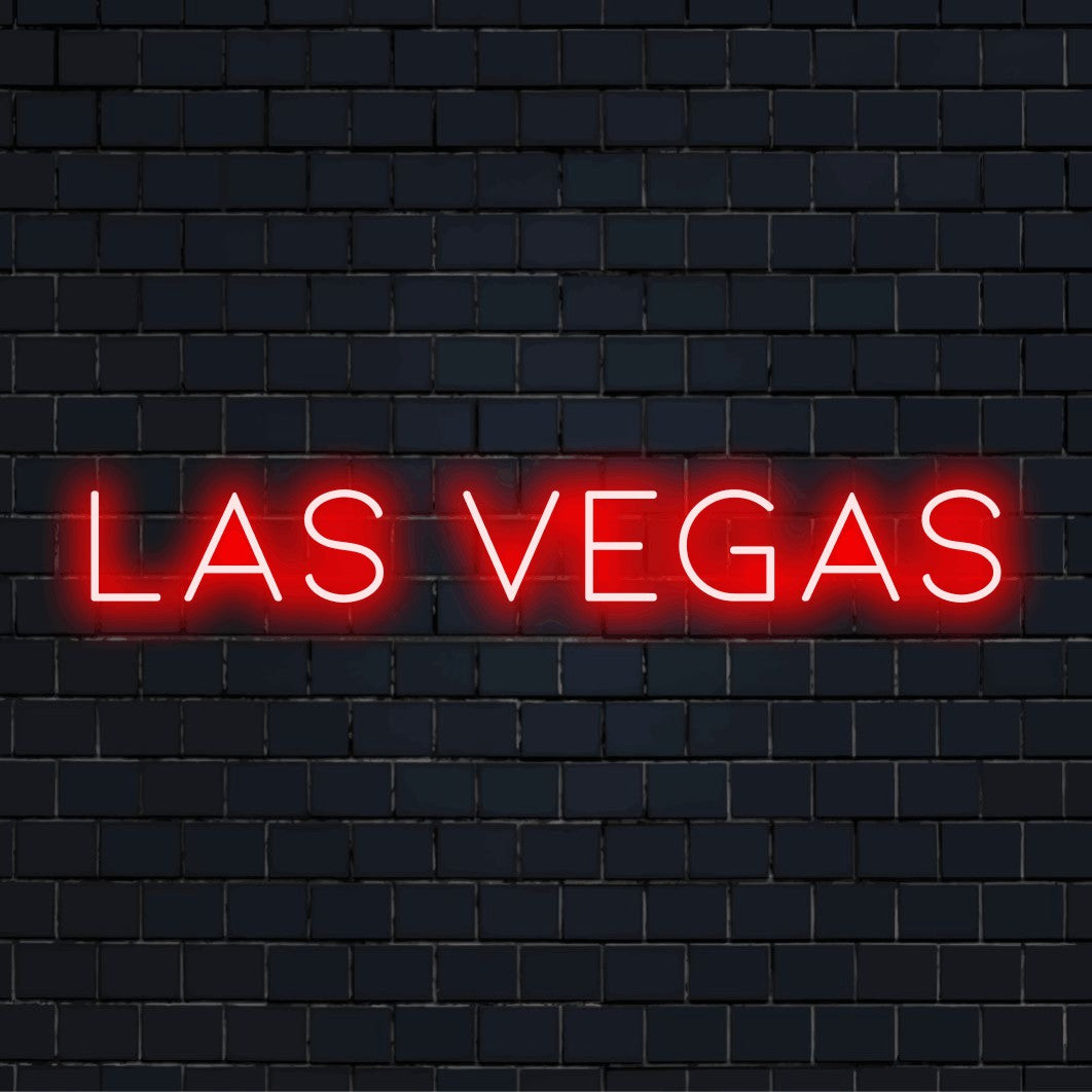 Las Vegas Neon Light with neon text light against brick backdrop
