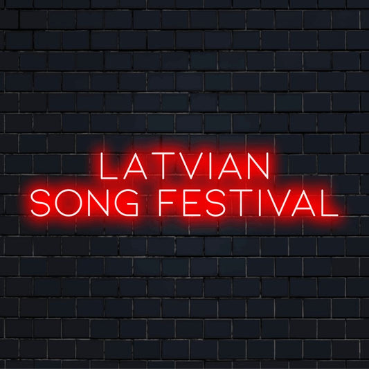 Latvian Song Festival Neon Sign, glowing lettering against black brick wall