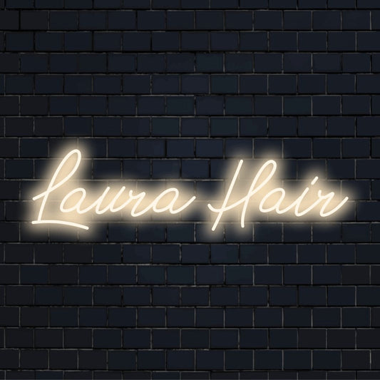 Laura Hair Personalized LED Neon Sign, glowing lettering against brick backdrop