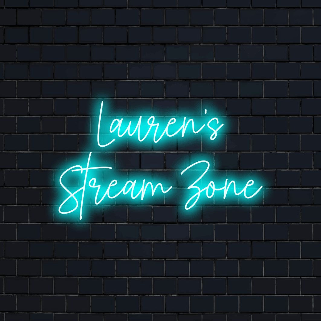 Lauren_s Stream Zone Custom Name Neon Sign, soft neon glow against black brick wall