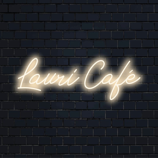 Lauri Cafe Custom Name Neon Sign, bright neon glow against brick backdrop