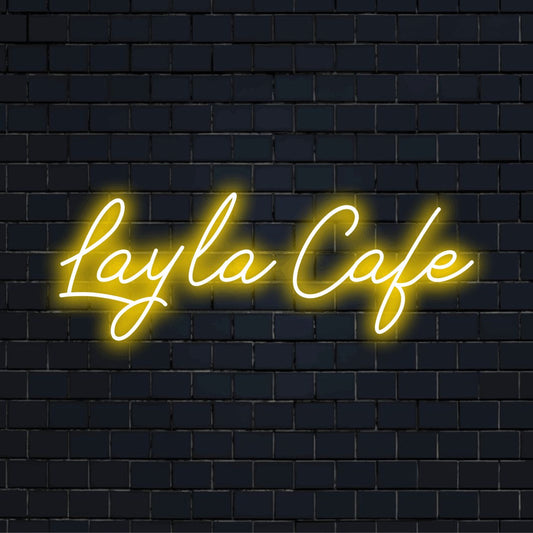 Layla Cafe Custom Name Neon Sign, glowing neon text on dark brick background