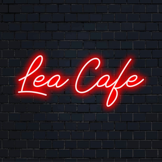 Lea Cafe Personalized LED Neon Sign, glowing neon text against black brick wall