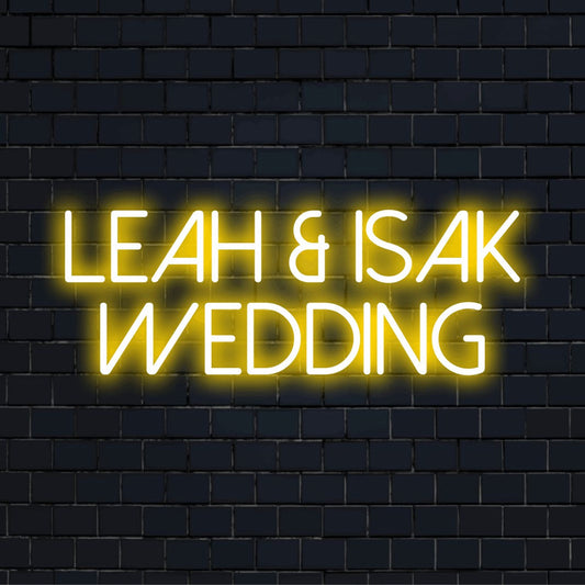 Leah _ Isak Wedding Custom Name Neon Sign, glowing wall decor on dark brick wall