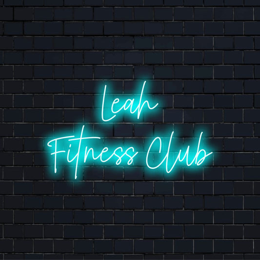 Leah Fitness Club Custom Name Neon Sign, neon text light on dark brick background
