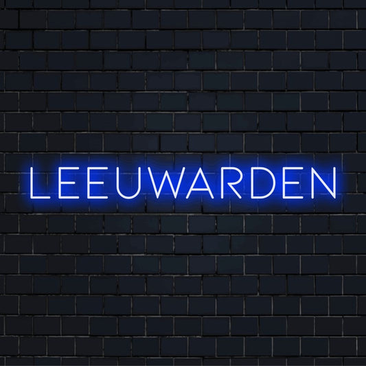 Leeuwarden Neon Light with glowing neon text on dark brick wall