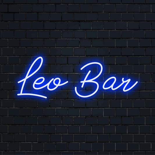 Leo Bar Personalized Neon Light with bright neon lettering on black brick background