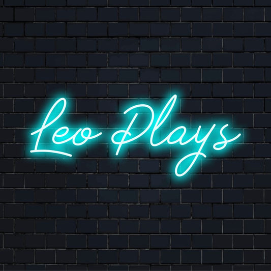 Leo Plays Custom Name Neon Sign, soft neon glow against brick backdrop