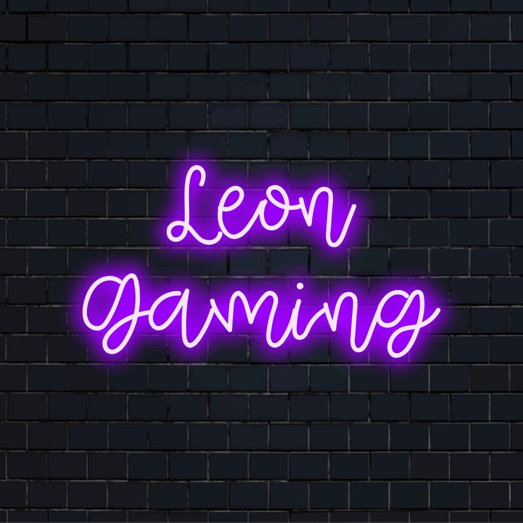 Leon Gaming Personalized LED Neon Sign, glowing neon text on dark brick wall