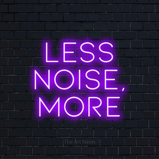 "Less Noise, More" LED neon sign on a black brick wall