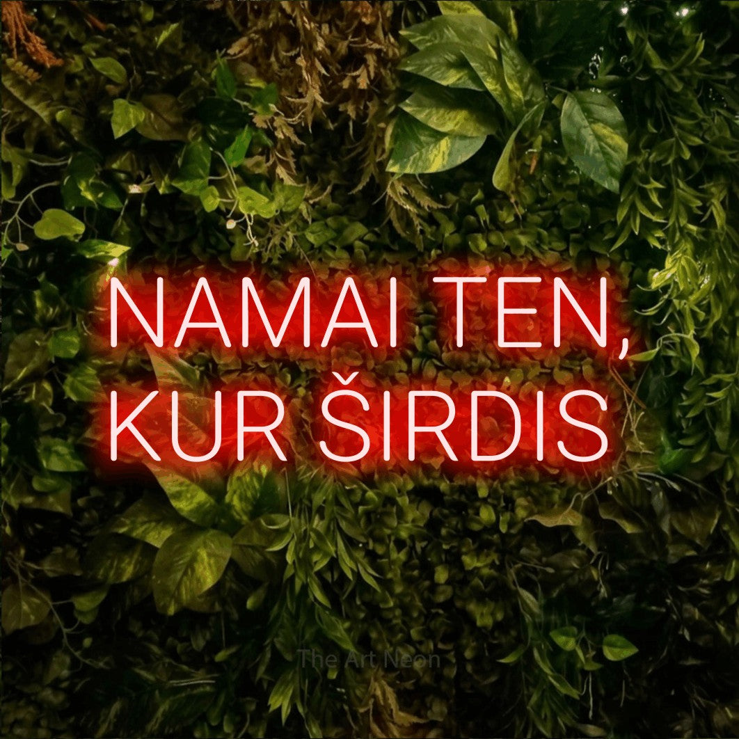 LED neon sign reading “NAMAI TEN, KUR ŠIRDIS”, arranged in two lines.