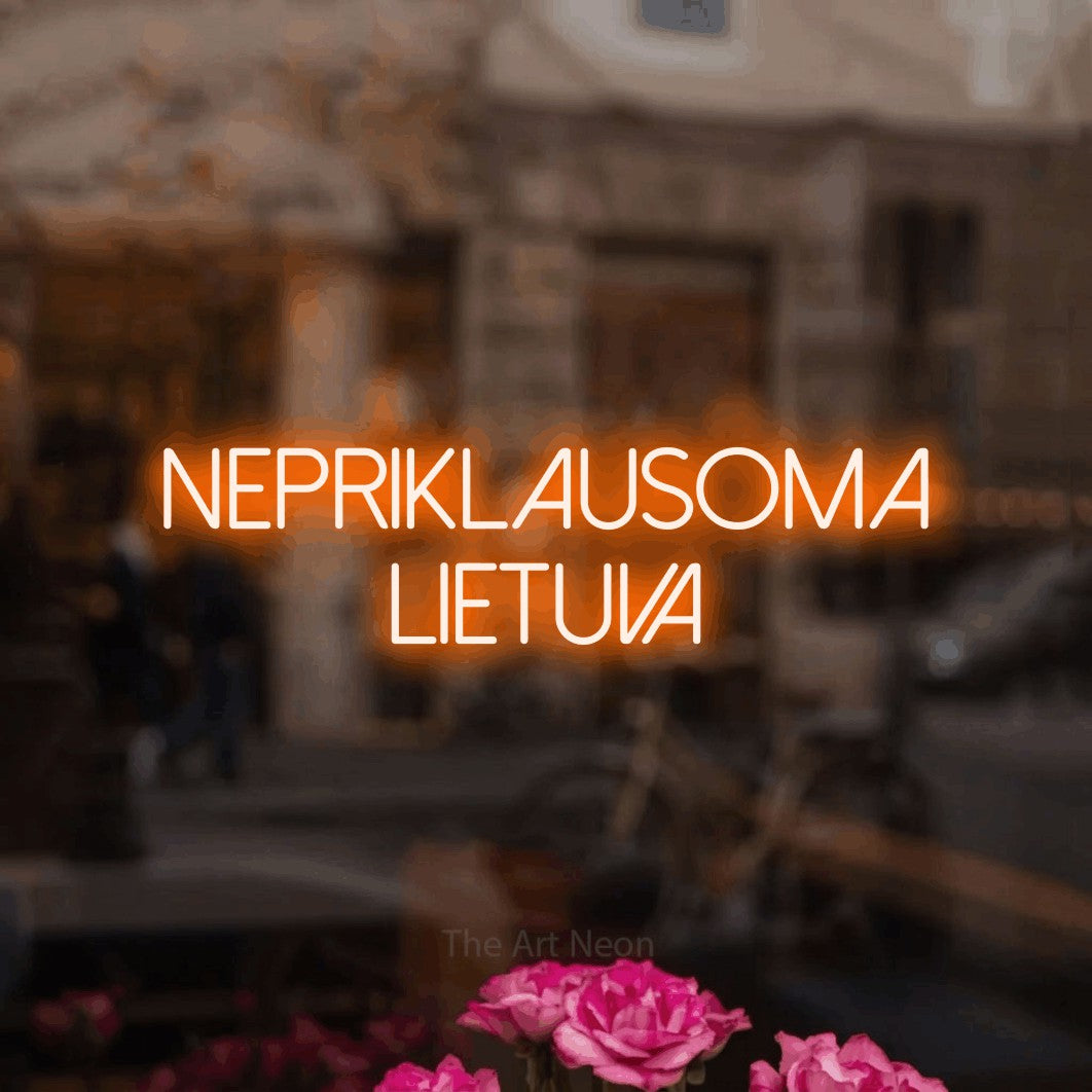 LED neon sign reading “Nepriklausoma Lietuva”, arranged in two lines.
