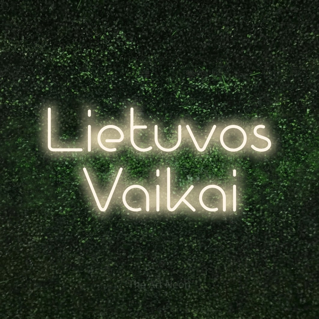 LED neon sign reading “Lietuvos Vaikai”, arranged in two lines.