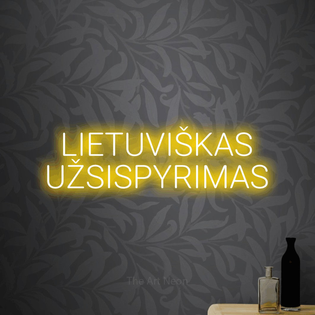 LED neon sign reading “LIETUVIŠKAS UŽSISPYRIMAS”, arranged in two lines.