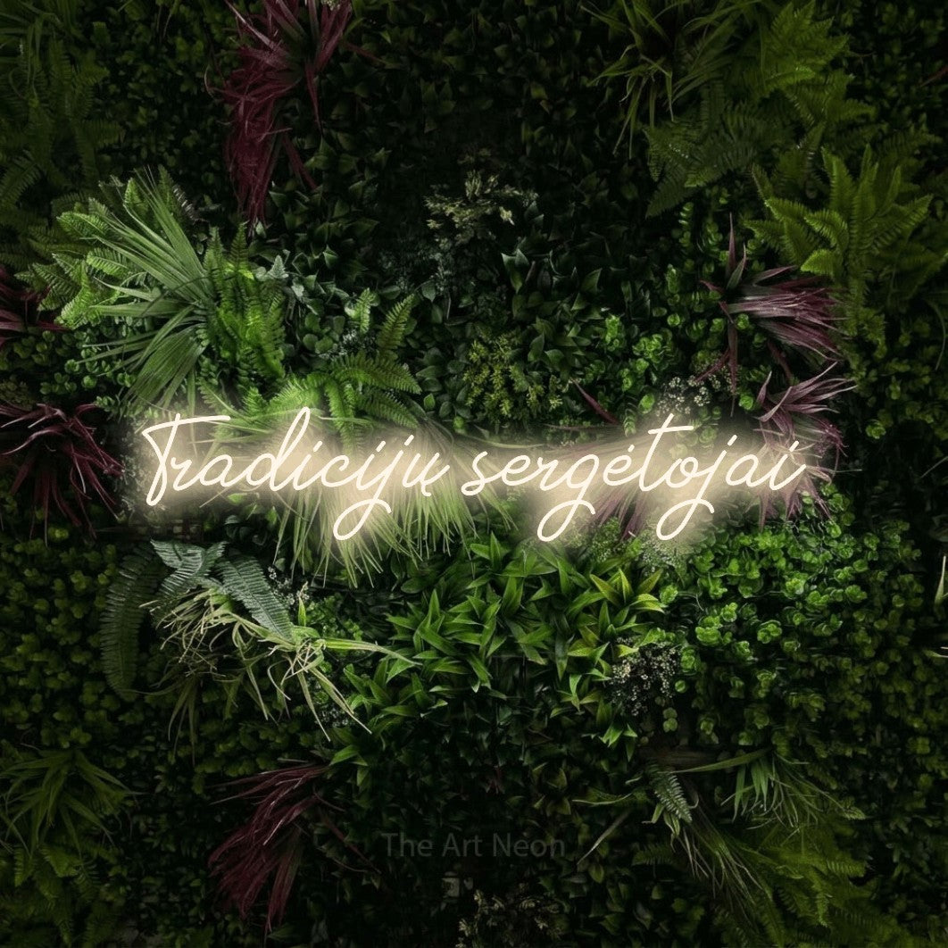 LED neon sign reading “Tradicijų sergėtojai”, arranged in a single line.